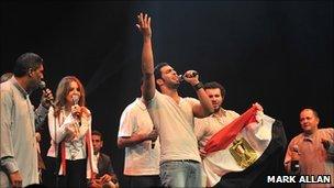 Azza Balba, Ramy Essam and members of El Tanbura