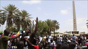 Senegalese rapper Omar Toure addresses a rally on Saturday in Dakar
