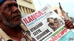 Newspaper vendor in South Africa