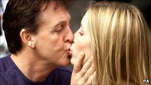 Sir Paul McCartney kisses Heather Mills