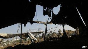 Site damaged by Israeli strike near Deir al-Balah, Gaza.