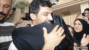 Matar Matar greeted by his mother. 7 Aug 2011