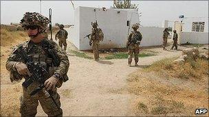 US troops accompanied by Afghan soldiers on patrol in Kandahar province, southern Afghanistan