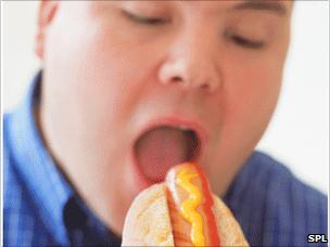 Man eating hotdog