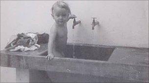 Washing clothes, Kasinthula, Malawi, 1975