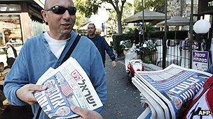 Newspaper reader in Israel