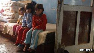 Roma children in their home in Alsozsolca, north of Budapest, Hungary