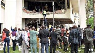 Rescue workers at UN building in Abuja, Nigeria - 26 August 2011