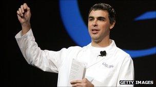 Larry Page in white lab coat