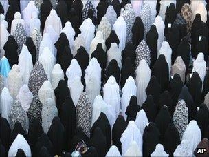 Iranian women at prayers, AP