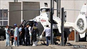 An injured person is evacuated by helicopter from the site in Marcoule, France (12 Sept 2011)