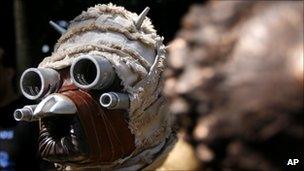 A Star Wars film fan dressed as a Tusken Raider