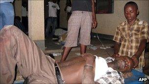 Victims of armed raiders who killed more than 20 people on September 18 and wounded about 20 others when they stormed a Burundi bar and opened fire on patrons is tended to at the Prince Regent Charles Hospital in Bujumbura on September 19, 2011.