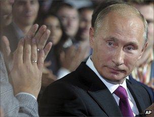 Russia's Prime Minister Vladimir Putin receives applause at the United Russia congress in Moscow, 24 September