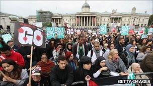 Members of the public attend the "Anti-war Mass Assembly" organised by the Stop the War Coalition in Trafalgar Square