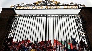 Football scarves tied to the Shankly Gates at Anfield