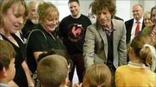 Mick Jagger meeting local school children