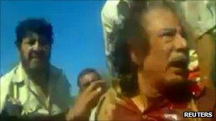 Image of Gaddafi's capture taken from amateur video, 21 October 2011.