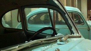 Colonel Gaddafi's damaged VW Beetle