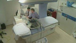 Surgeons using the high intensity focused ultrasound (HIFU) machine
