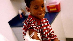 Boy being vaccinated