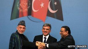 (L to R) Afghanistan's Karzai, Turkey's Gul and Pakistan's Zardari