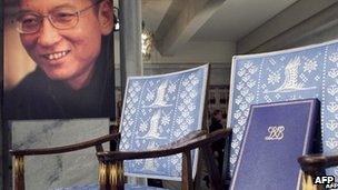 A picture of Liu Xiaobo next to his empty chair at the Nobel prize ceremony on 10 December 2010