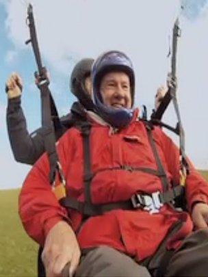 Amputee Norman Croucher from Devon takes up paragliding - BBC News