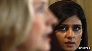 US. Secretary of State Hillary Clinton speaks as Pakistan's Foreign Minister Hina Rabbani Khar listens during a joint press conference in Islamabad on 21 October