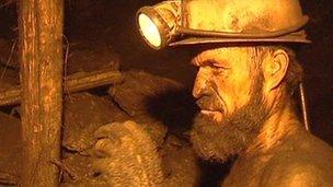File photo of Afghan coal miner (June 2010)