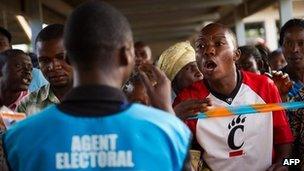 A voter shouts at an election official at the Njanja polling station in Lubumbashi on 29 November 2011