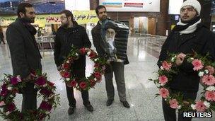 Supporters of the expelled Iranian diplomats at Tehran airport - 3 December 2011