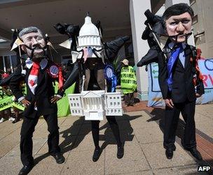 Environmental campaigners outside the climate talks, Durban (Image: AFP)