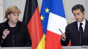 Germany's Chancellor Angela Merkel and French President Nicolas Sarkozy, 5 Dec 11