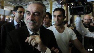 Luis Moreno-Ocampo arrives at a hotel in Tripoli on 22 November 2011.