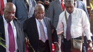 Papua New Guinea Prime Minister Michael Somare (C) and his cabinet and ministers at Government House in Port Moresby on December 14,