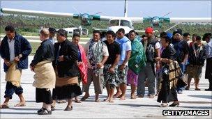 Sinking ferry survivors arrive at Tongapatu island airport