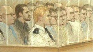 Artist's impression of the defendants and prison officers in the dock