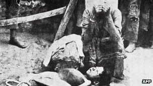 An Armenian woman mourns a dead boy during the deportations in 1915