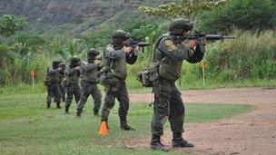 Members of the Jungla team training on a shooting range in Colombia