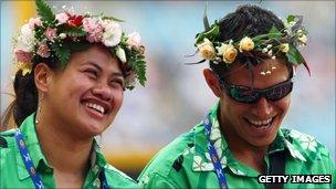 two athletes laughing