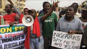 A young man shouts slogans at a protest in Lagos, Nigeria