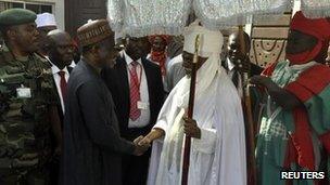 Emir of Kano Ado Bayero (R) welcomes President Goodluck Jonathan during his visit to the northern city of Kano January 22, 2012, following bomb attacks that took place on Friday. Gun and bomb attacks by Islamist insurgents in the northern Nigerian city of Kano last week killed at least 178 people, a hospital doctor said on Sunday