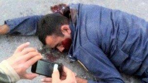 Badly beaten police officer lies unconscious in Shia village
