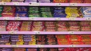 Chocolate bars on supermarket shelves