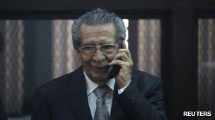 Former Guatemalan leader Efrain Rios Montt speaks on the phone at the Supreme Court of Justice in Guatemala City on 26 January, 2012.