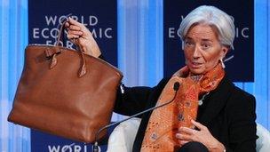 Christine Lagarde and her handbag