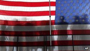 American flag with silhouettes