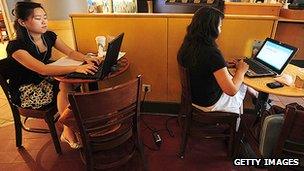 Women in a Beijing internet cafe