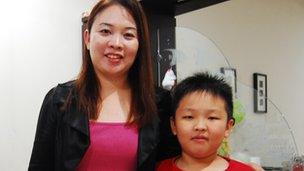 Aw Yee Han and his mother